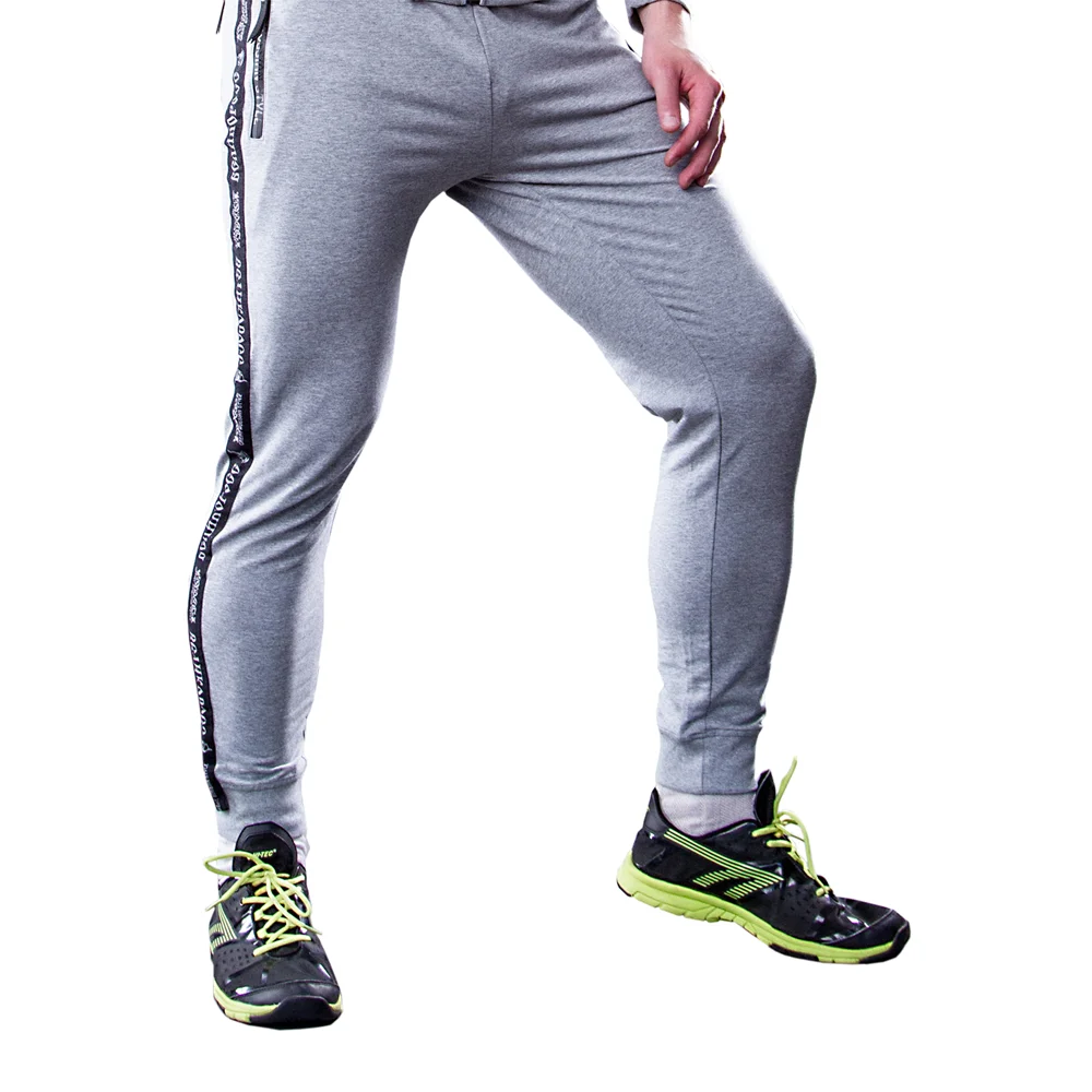 Спортивные штаны Великоросс цвета серый меланж жаккардовые лампасы и брендовые