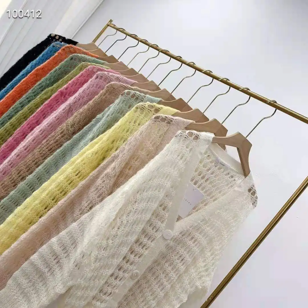 

2021 Spring Women's Thin Big Button Hollow Knit Cardigan Single-breasted Solid Color Cardigan