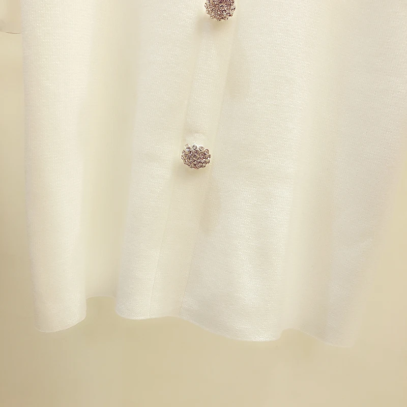 

2021 Summer New Plain Blouse Elegant V-neck Drill Buckle Stitching Satin Puff Short Sleeve Knitted Shirt Women's Casual Slim Top