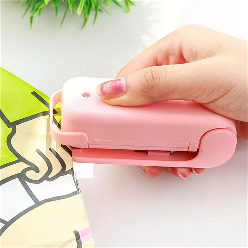 

Portable Household Sealing Machine Sealer Food Saver Bag Capper Hand Pressure Hot Magic Sealer 1PCS
