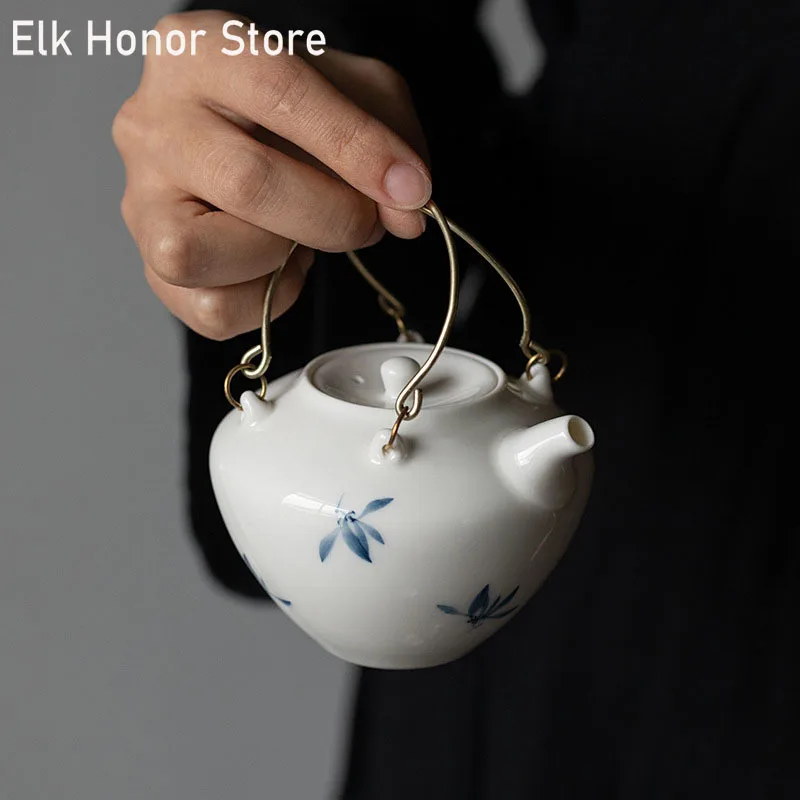 

Маленький керамический чайник ручной росписи с бабочкой и орхидеей, 160 мл