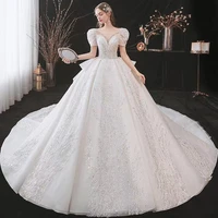 luxury princess wedding dress puff sleeves scoop neck lace beading sequins shiny starry sky illusion tail french bridal gown new