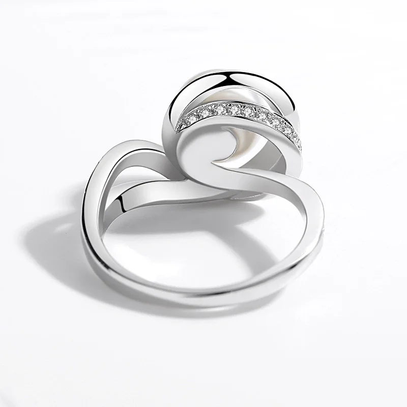 Кольцо женское из серебра 925 пробы с австрийским кристаллом и искусственным