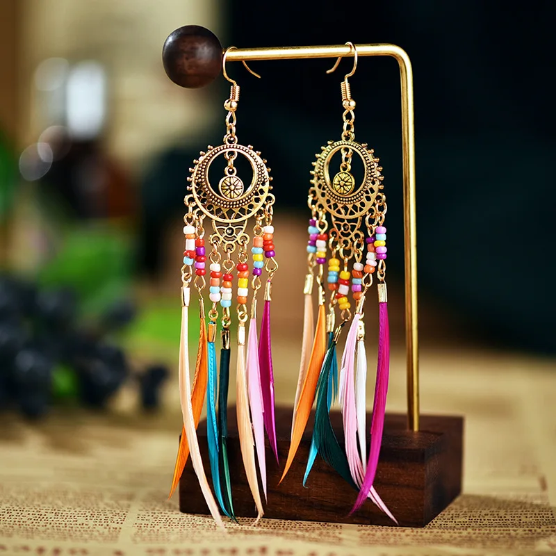 

Fashion Retro Hollow Long Feather Earrings European And American Colorful Rice Bead Tassel Earrings