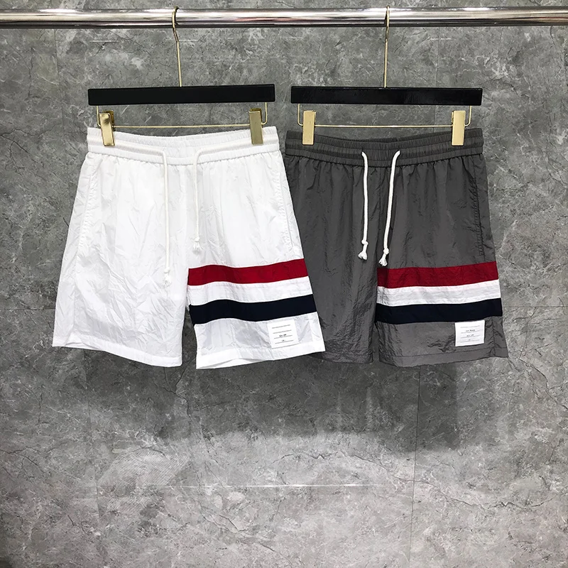 

THOM TB Shorts Fashionable Brand Custom Wholesale Interlocking RWB Stripe Mid-Thigh Shortpants Men Summer Boardshorts
