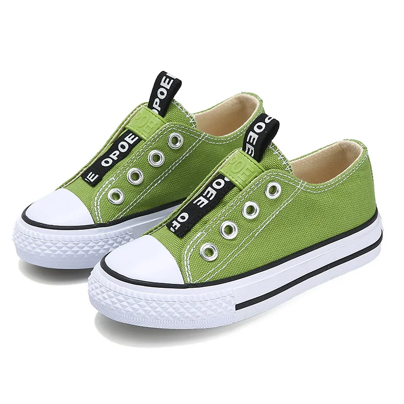 

New Low Top Men's and Girls' Canvas Shoes Korean Version of Students Leisure Sports Shoes a Solid Color Board Shoes