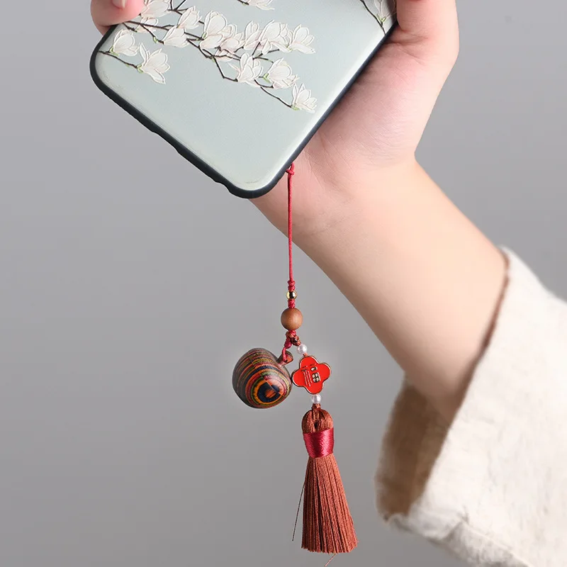 

Chinese element creative opening and closing rainbow apple mobile phone chain Pingguo mobile phone pendant pendant female