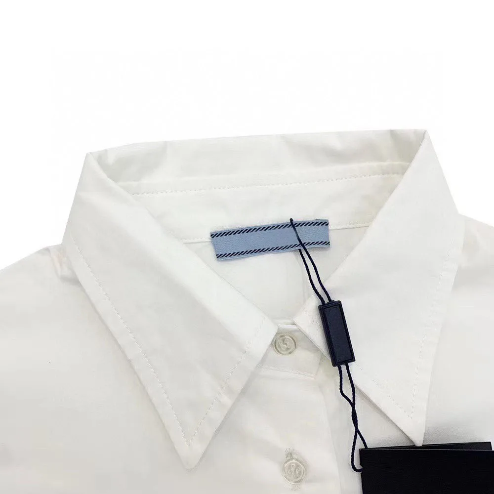 

2021 ladies new summer fashion pure white lapel shirt sleeve lotus leaf decoration leisure