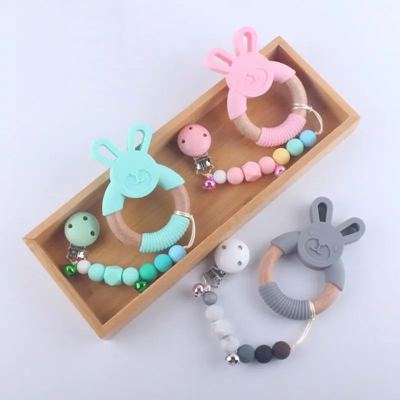 

Baby Pacifier Chain Clip with Bells Nipple Holder Silicone Teether Teething Soother Molar Chewable Nursing Toys Gifts