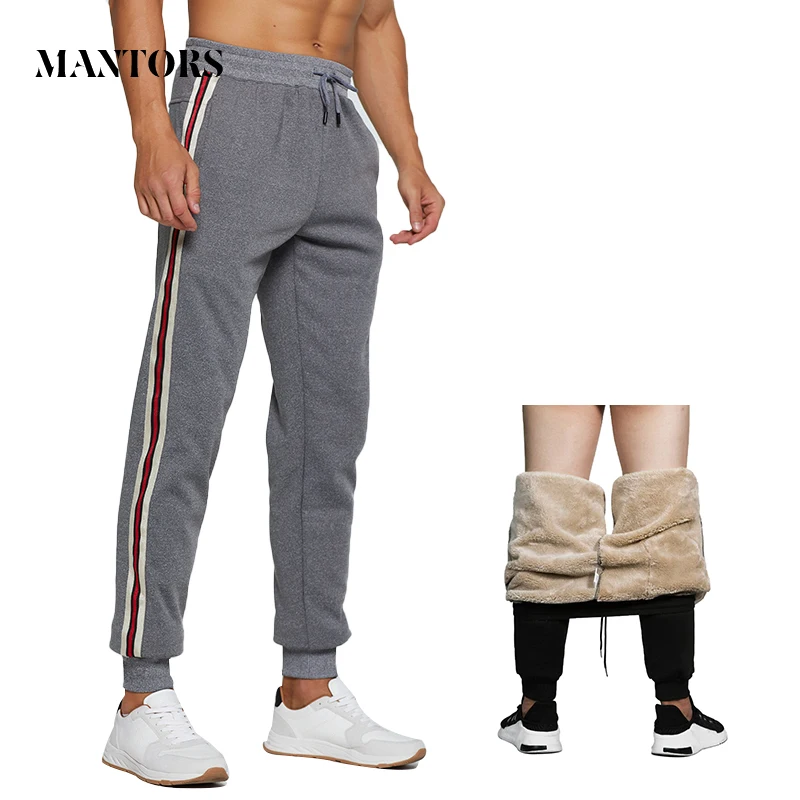 Мужские спортивные брюки на завязках темно синие утепленные штаны с флисовой