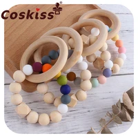 coskiss bpa free wooden ring baby teether rainbow silicone beads teether bracelets newborn teething toys rodent molar toys