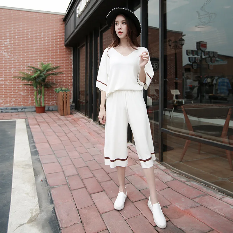 

Fashion women's suit summer ice silk V-neck sweater top + seven-point wide-leg pants leisure home suit two-piece suit