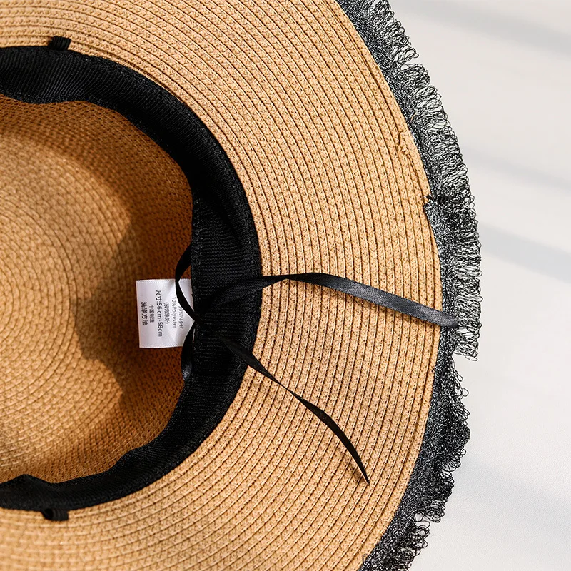 Соломенная шляпа с большим бантом для весны и лета |