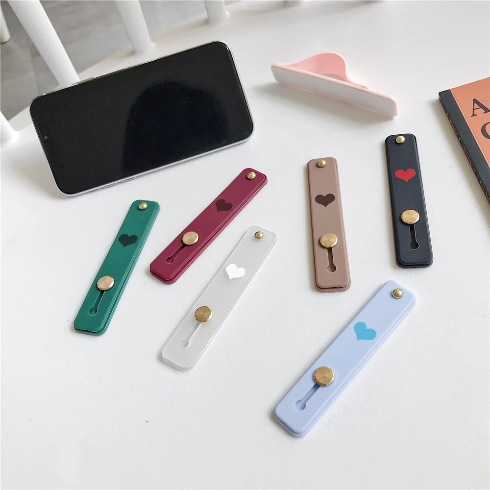 

Silicone Phone Holder Finger Ring Push Stretch Pull Grip Stand Heart Candy Color Bracket Buckle Wrist Mobile Universal Hand Band
