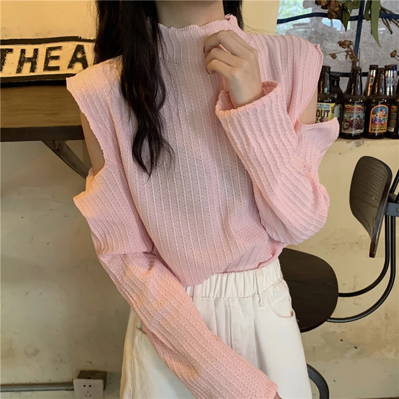 

Real shot --- new design, loose and versatile, hollow out long sleeve sweater for women