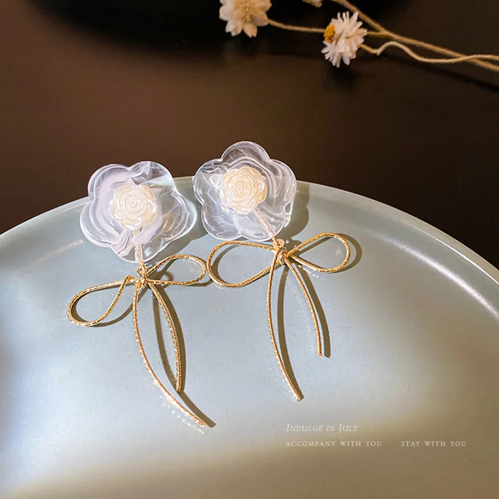 

Simple and fresh acrylic metal bow flower I net red temperament earrings Korean fashion earrings jewelry