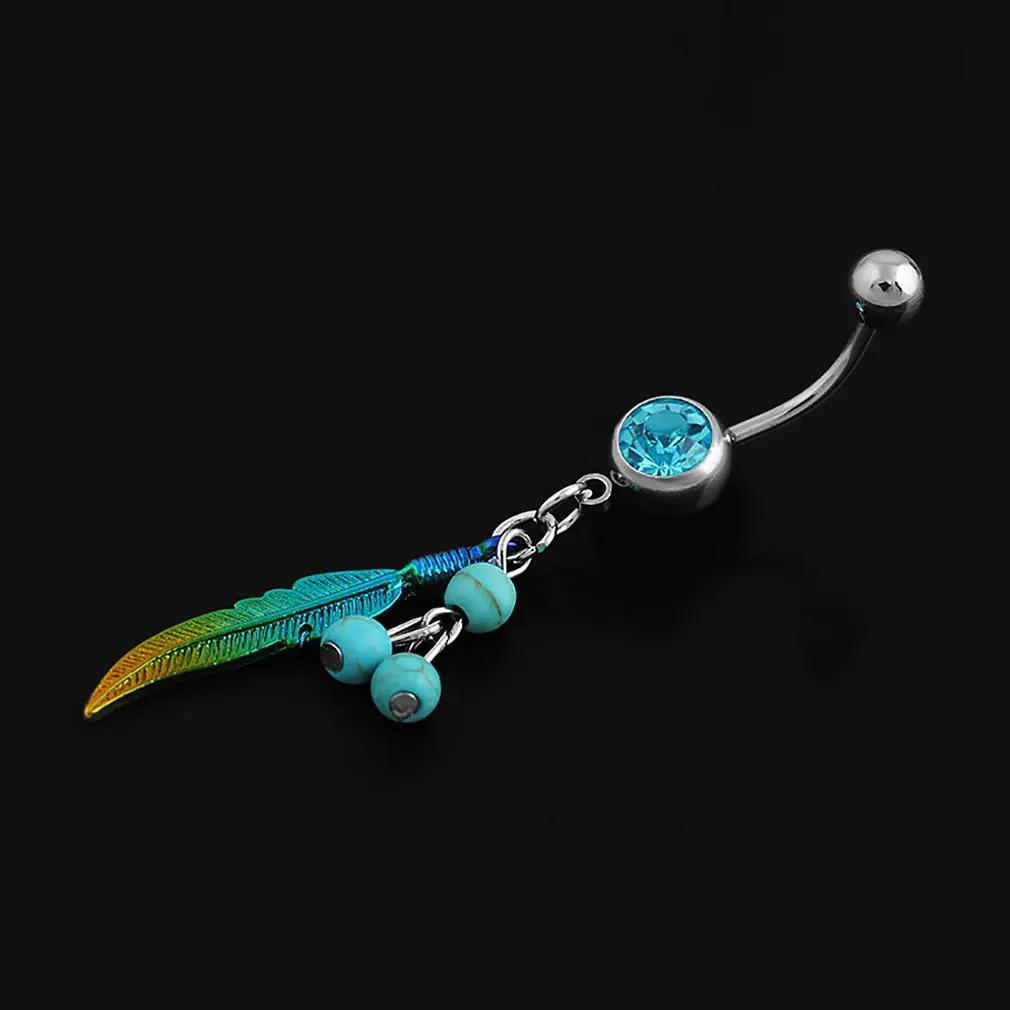 Кольцо в пупок с бирюзовым камнем и перьями |
