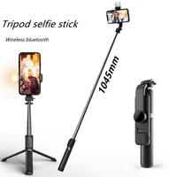 the new wireless bluetooth selfie stick foldable mini tripod with fill light shutter remote control selfie stick for ios android