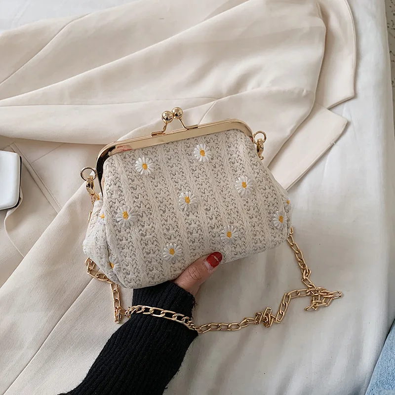 

Straw Woven Bag 2021 New Spring And Summer Woven Ins Small Daisy Clip Temperament Shoulder Casual Messenger Small Bag Tide