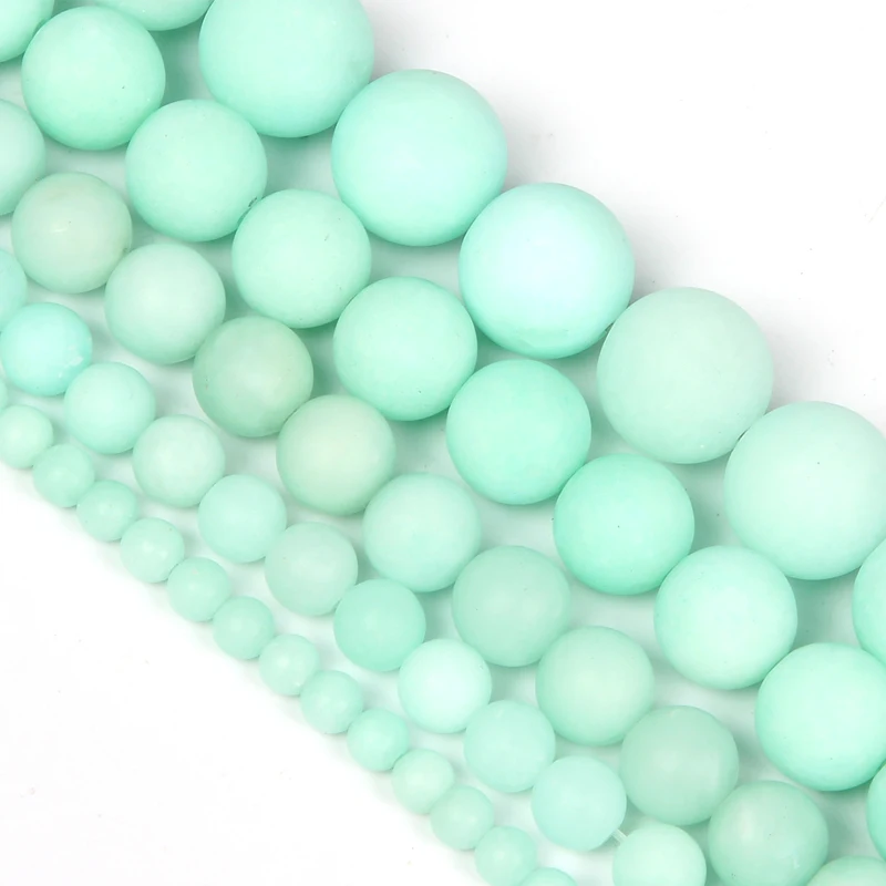 Круглые бусины из матового светло-зеленого агата незакрепленные натурального