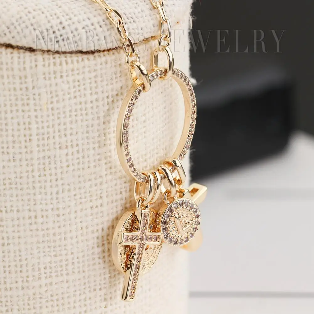 Длинное круглое ожерелье с цепочкой двойным крестом из фианита золотого цвета