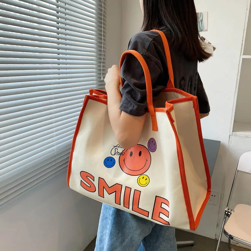 

NEW Casual Canvas Handbag Women Large Capacity Handle Bag Cute Smile Shopping Tote Bag Fashion Simple Shoulder Bag Environmental
