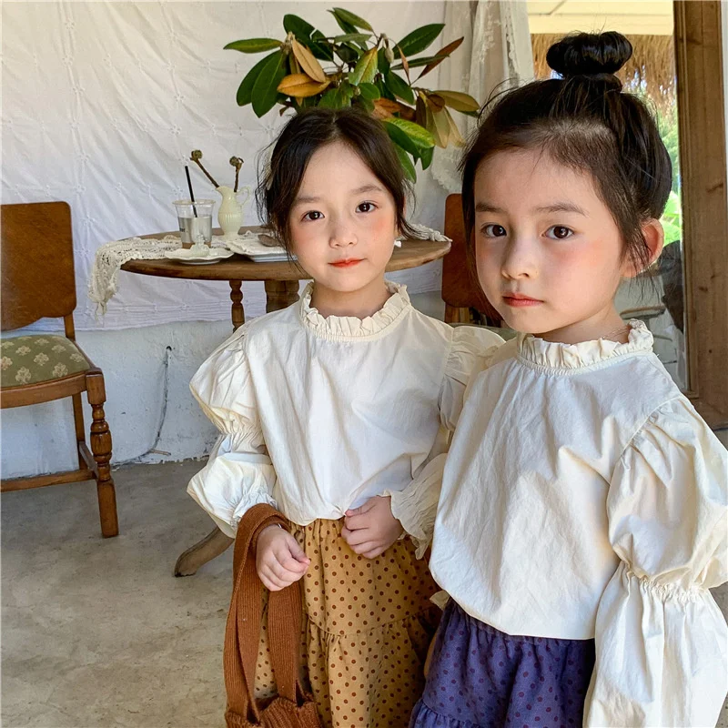 

2021 Fall new girls fashion solid color cotton blouses floral loose casual puff sleeved Tops kids clothing
