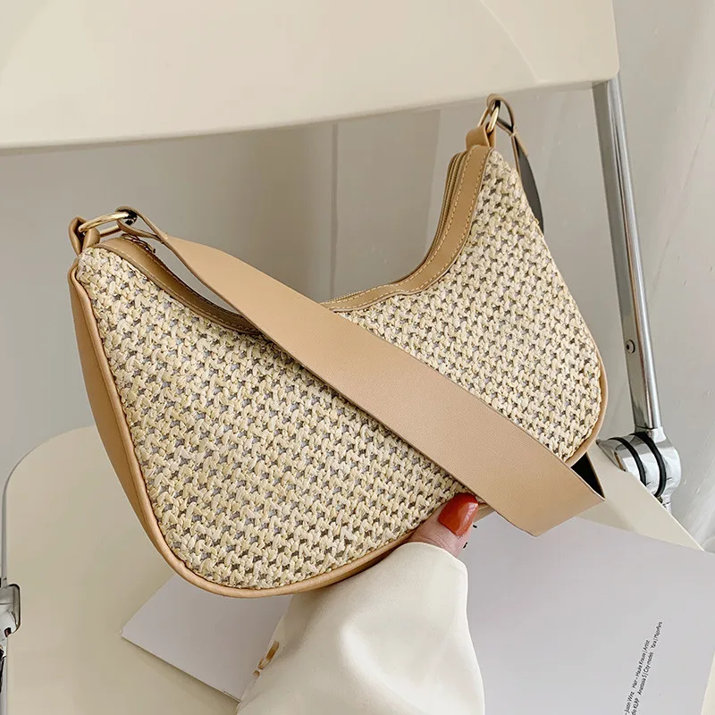 

On the new woven small bag female summer 2021 new Korean version of the shoulder bag texture fashion wide band straw woven armpi