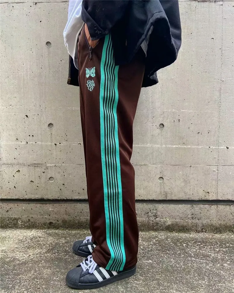 

Брюки спортивные полосатые с вышивкой «бабочка» для мужчин и женщин