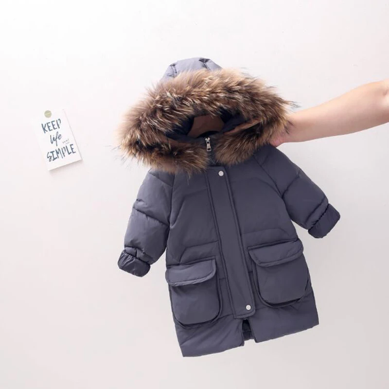 

Детский пуховик с воротником из натурального меха, на белом утином пуху