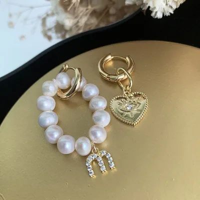 

Love Earrings For Gorgeous Ladies Pearl Asymmetric Vintage Baroque Tassel Earrings New Fashion Exquisite 2021 Style Tide