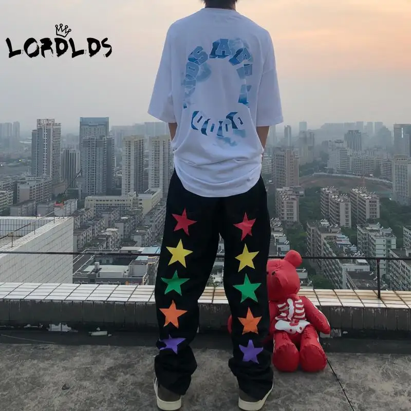 Брюки-карго мужские черные с принтом в виде звезд