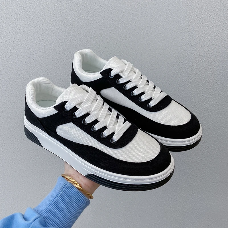 

Black and white panda shoes 2021 new round head lace up casual shoes thick soled canvas shoes women's fashion