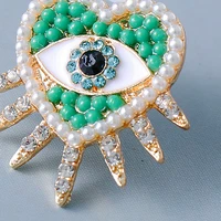 top new trend fashion high quality earrings green eye accessories earrings for women advanced texture metal jewelry preferred