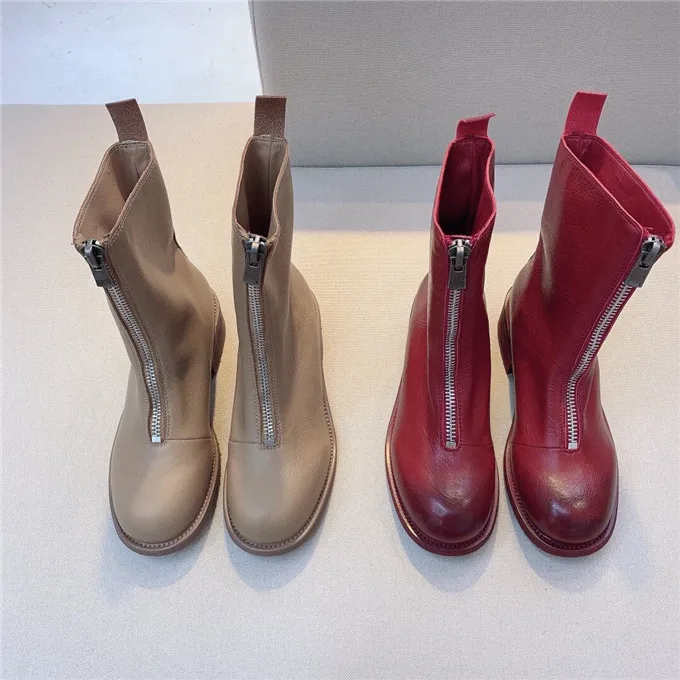 

Женские кожаные ботинки средней длины, на молнии спереди