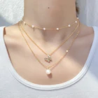 Женское многослойное жемчужное ожерелье, чокер с золотыми жемчужинами в форме бабочки и звезды, модная Подарочная бижутерия, 2021