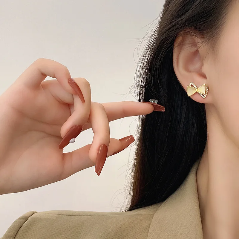 

S925 Silver Needle Contracted Opal Earrings Female Niche Design Web Celebrity Earrings Temperament Bowknot Delicate Stud Earring