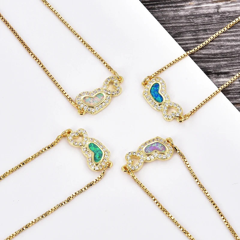 Браслет KAMAF с опалом в форме сердца регулируемый из меди и циркония ювелирное