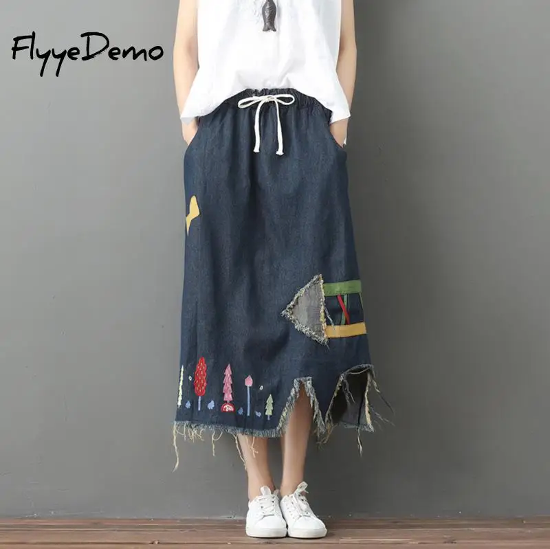 Женская джинсовая юбка до середины икры большого размера с дырками и кисточками