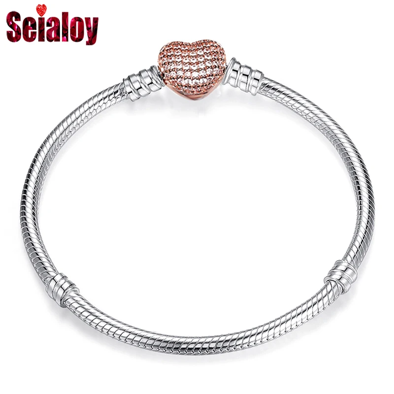 Плотный браслет Seialoy из розового золота с инкрустацией в форме сердца и змеиная