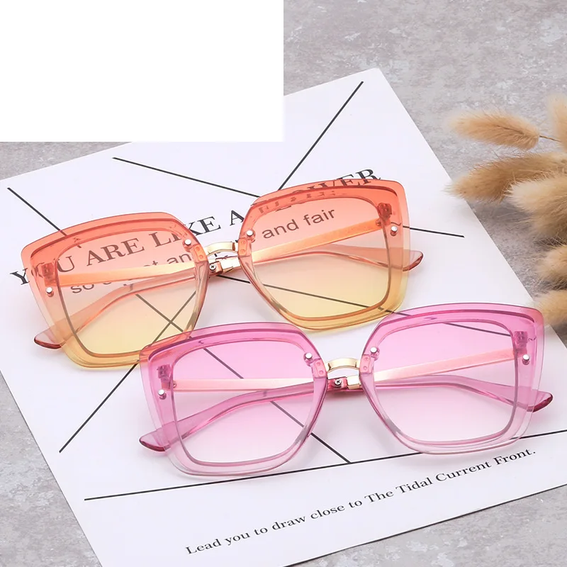 

Free shipping New big frame cat's Eye trend versatile men's and women's fashion Sunglasses