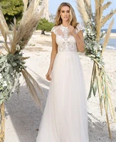 bohemian beach wedding dress a line cap sleeve lace appliques o neck button sweep train vintage bride gown vestidos de noiva
