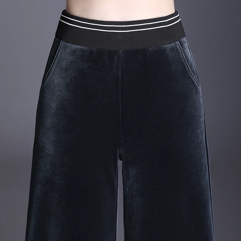 Зимние теплые длинные брюки с широкими штанинами черные флисовые свободные