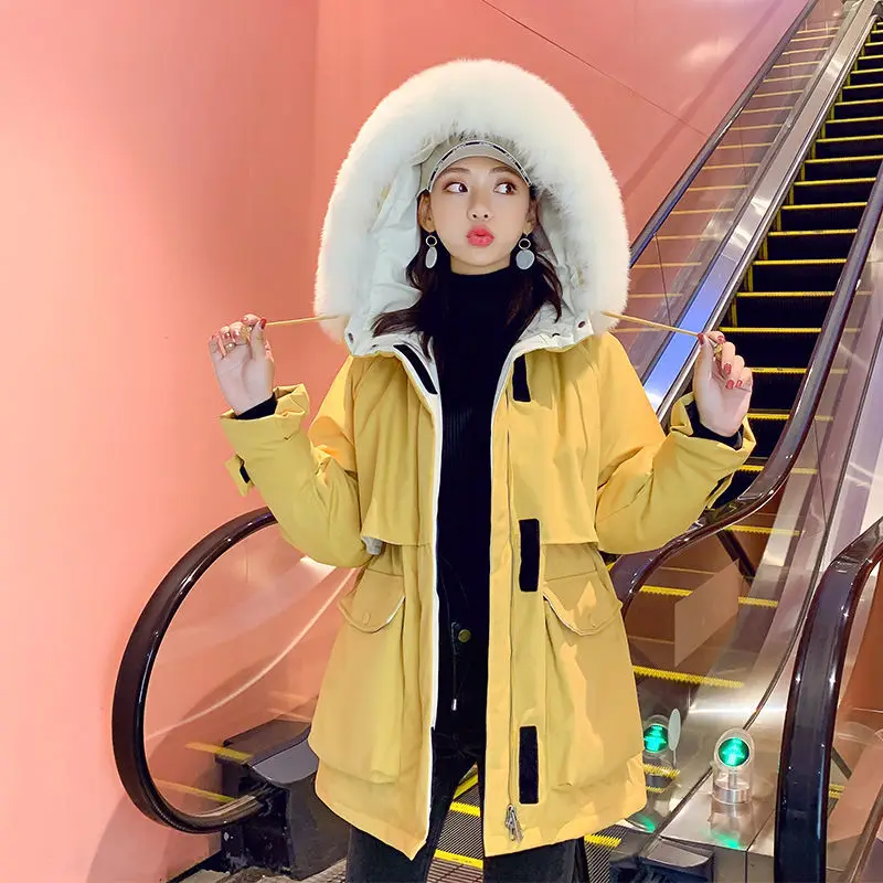 

Feather collar white duck down down jacket women's middle and long European station new thickening fashion Velcro coat fashion