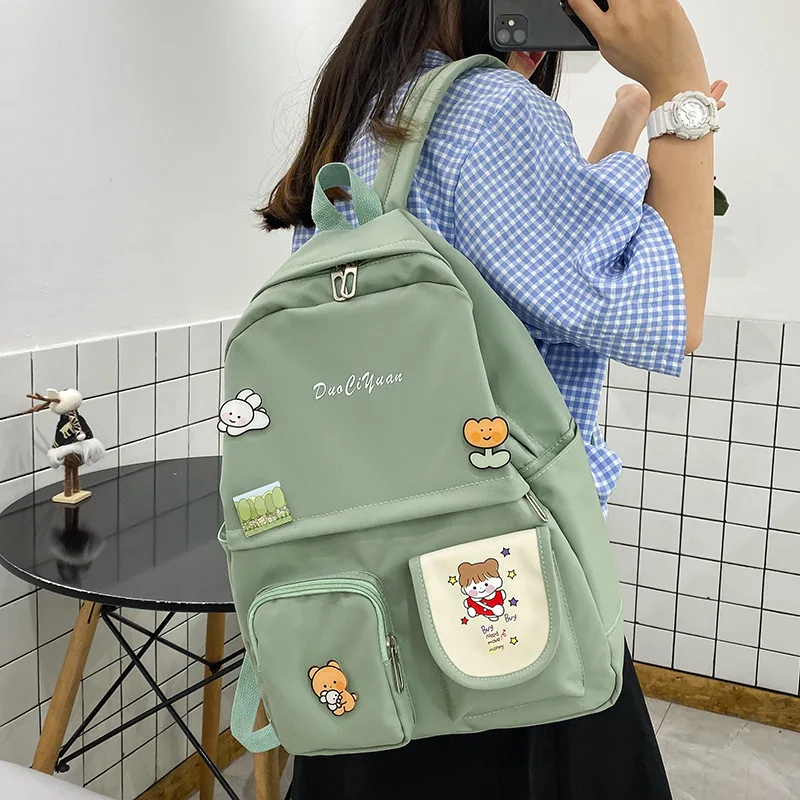 

Harajuku cute cartoon decoration school students backpack can be matched with pure color cute girls backpack
