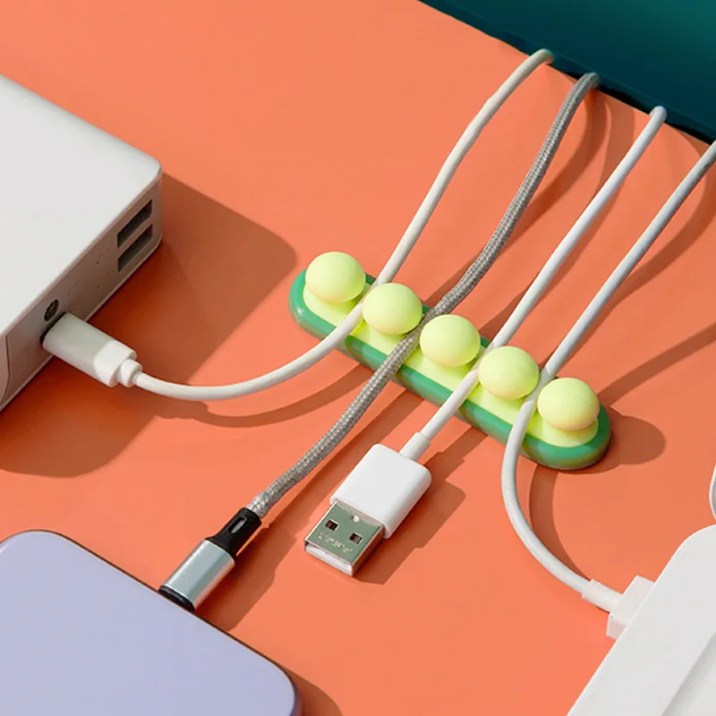 

Desktop cartoon silicone cable organizer, charging cable storage device, self-adhesive cable winder, data cable cable winder