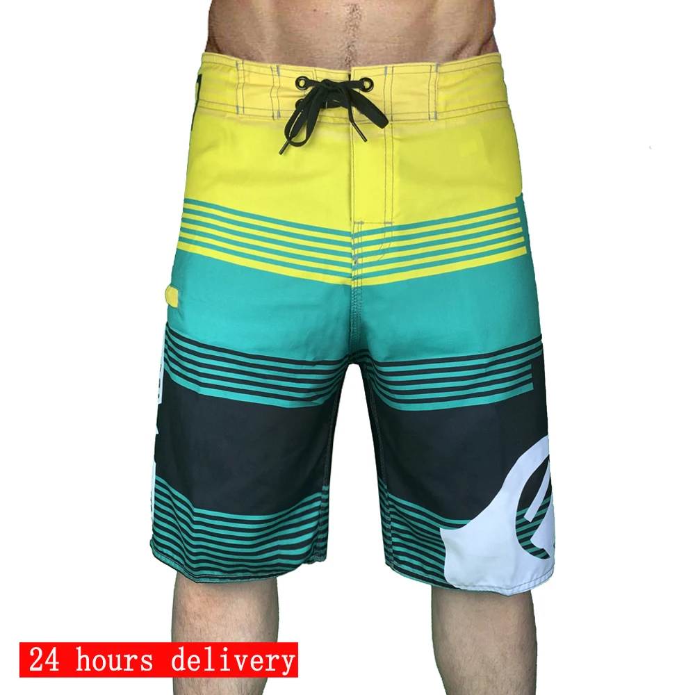 

2023 new men's surf beach pants water sports casual pants running fitness pants five-point slant pants swimming pants swimsuit