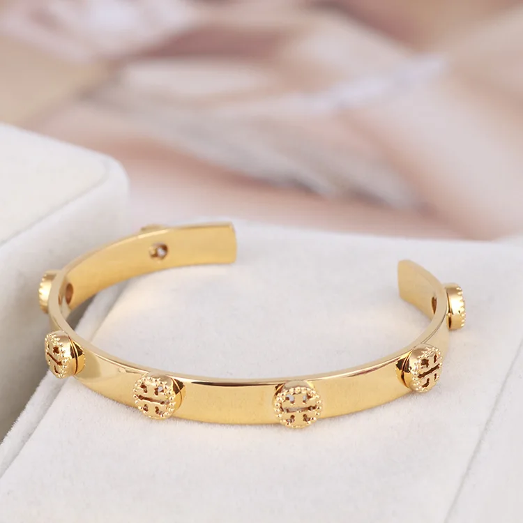 

Fashion hollow letter metal open texture bracelet
