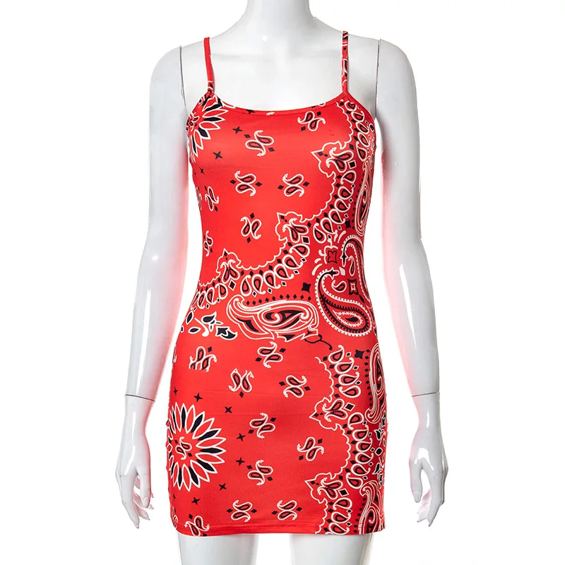

European and American women's 2021 spring and summer new cashew flower print sling reveal backpack hip ultra short dress