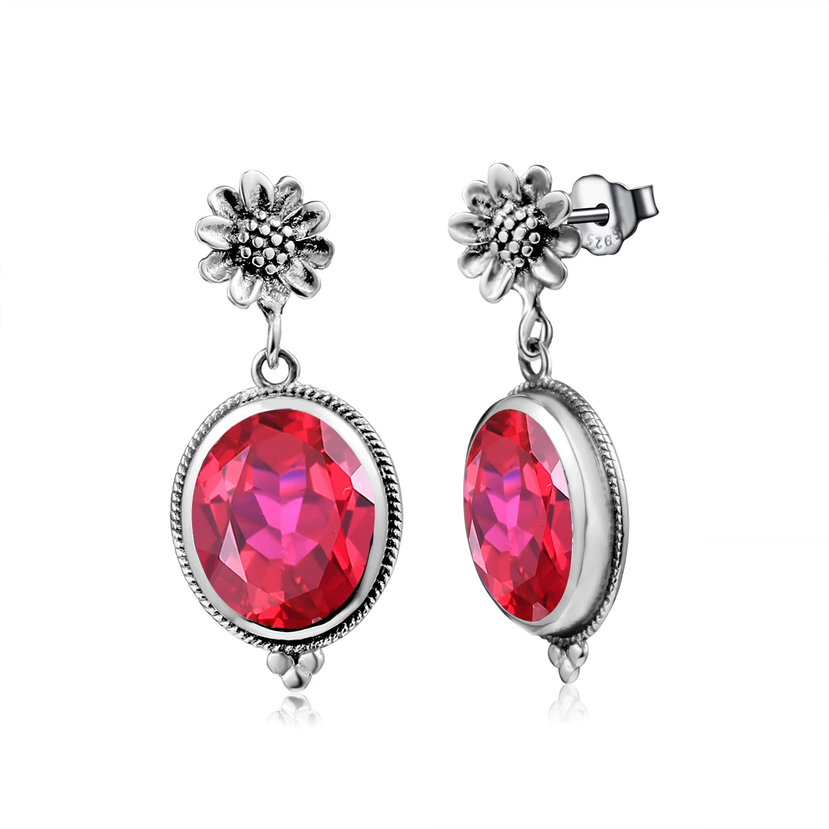 

Женские серьги-гвоздики из серебра 100% пробы с овальным камнем